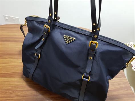 prada nylon shoulder bag gold tone blue|prada nylon shoulder bag price.